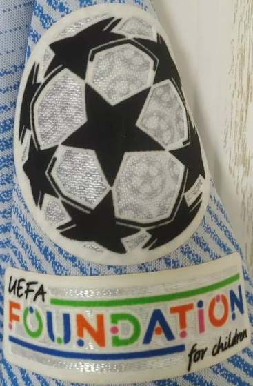 Manchester United 2021-22 Away Kit Champions League and UEFA Foundation patch detail