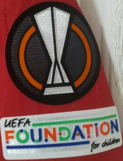 Manchester United 2022-23 Home Kit Europa League and UEFA Foundation patch detail